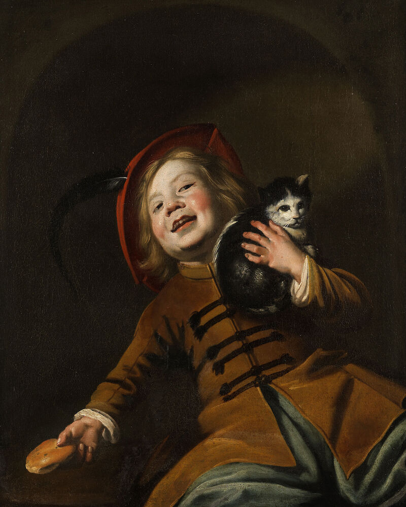 Boy with a cat, red hat and a piece of bread scale comparison