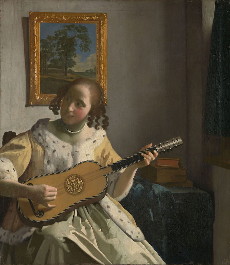 Young Woman Playing a Guitar scale comparison